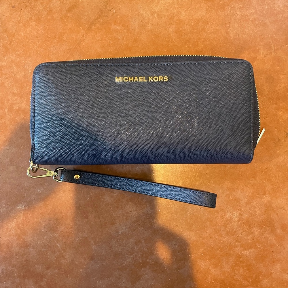 Blue leather Michael Kors long wallet/wristlet w/gold writing